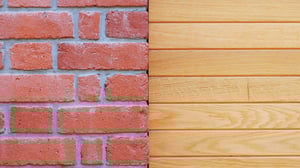 construction detail of red brick against timber cladding