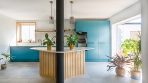 kitchen island with central supporting post, two peace lilies on the top