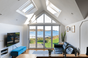 view through large windows out toward Gyllyngvase beach