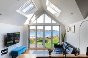 view through large windows out toward Gyllyngvase beach