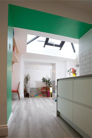 view of dining room and playroom in the background