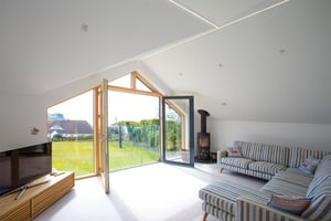 sitting room with open doors and juliette balcony