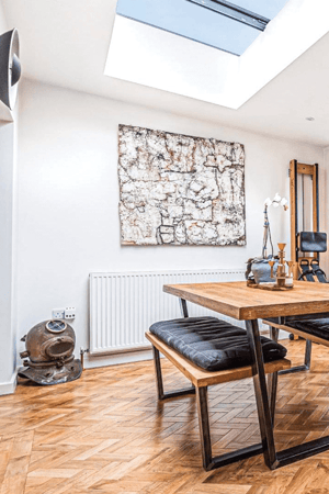 dining table with large roof light