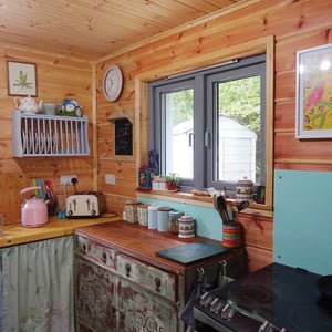 freestanding kitchen arrangement with various patterned storage jars