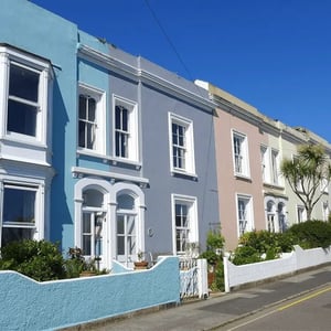 external view of a Victorian terrace property with clear blue skies