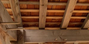 Close up of a wooden beamed roof 