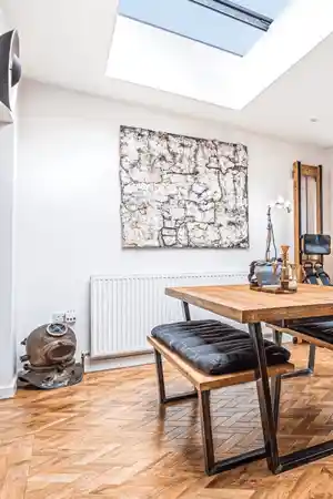 dining table with large roof light 